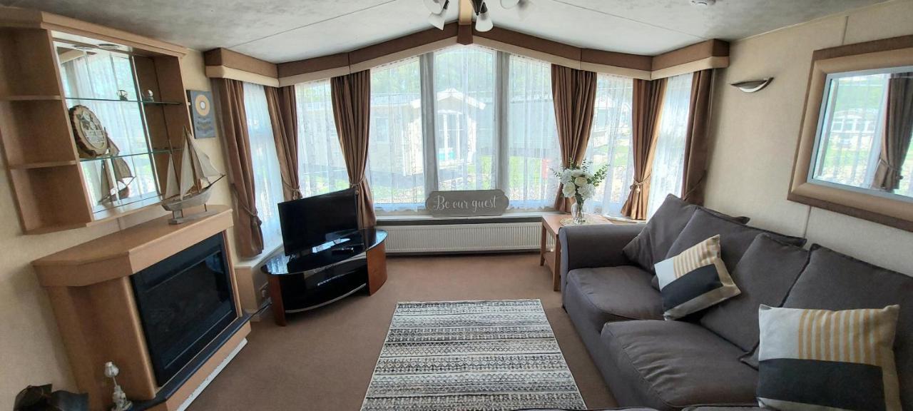 A Fashionable Caravan In A Peaceful Seaside Town Campsite